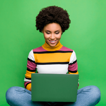 person looking at laptop smiling